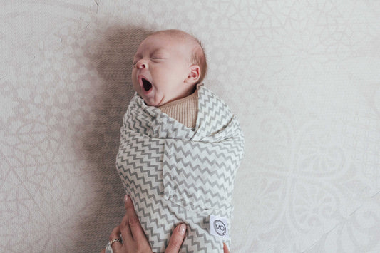 Baby sleep training / guidance swaddled and secure